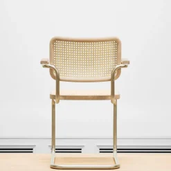 JS. THONET a personal Interpretation by Jil Sander S 64 V Nordic Freischwinger Armlehnstuhl mit Rohrgeflecht
