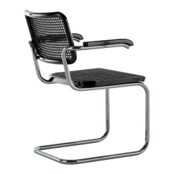 JS. THONET a personal Interpretation by Jil Sander S 64 V Serious Freischwinger Armlehnstuhl mit Rohrgeflecht